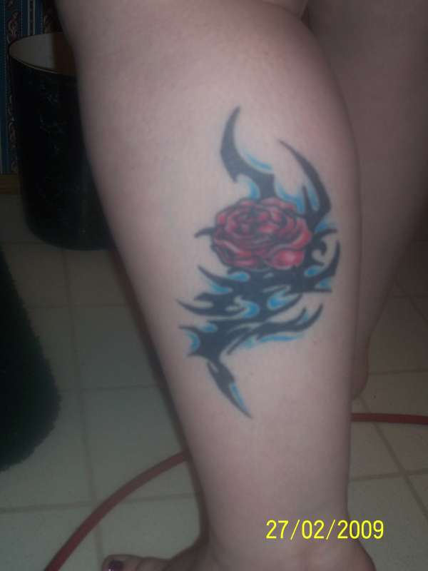 rose with tribal tattoo