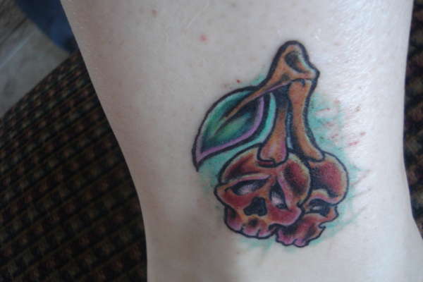 cherry skulls tattoo