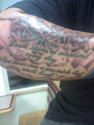death stares at mankind every day what more can a mortal do... tattoo