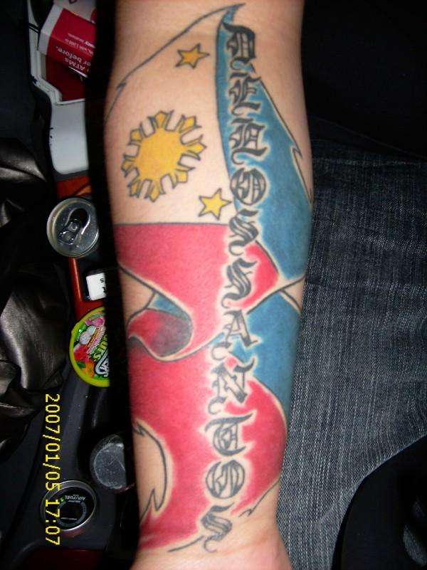 fillipino flag n my last name tattoo