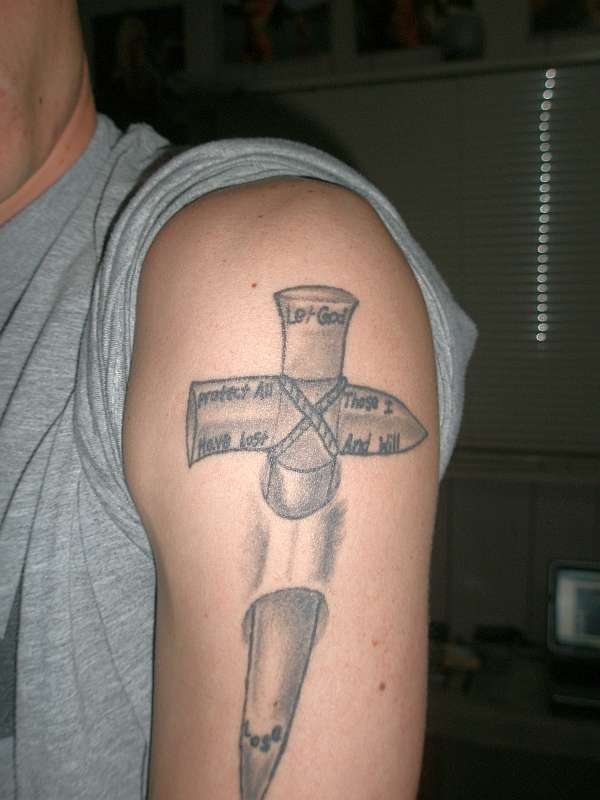 Tear Cross tattoo