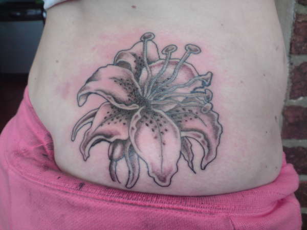 Tiger lilly on the hip tattoo