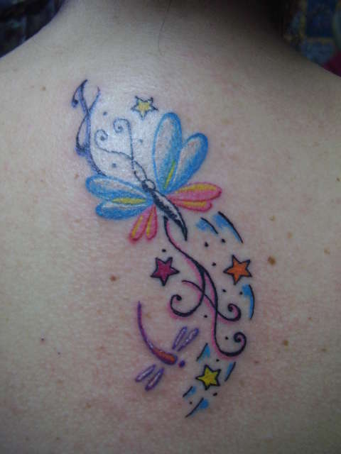 butterfly in back tattoo