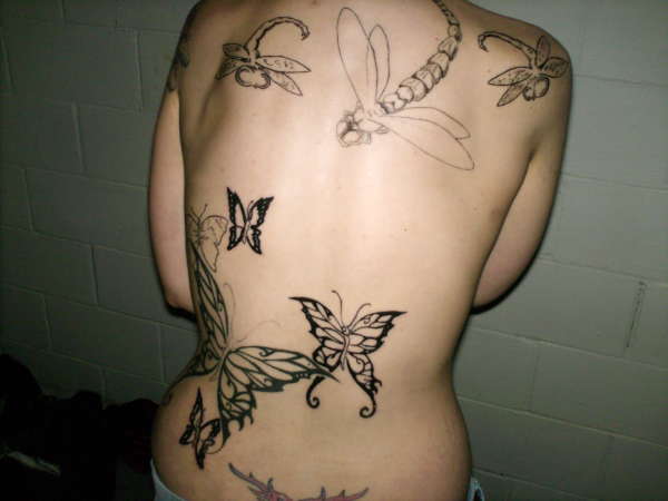 butterfly and butterfly scene tattoo