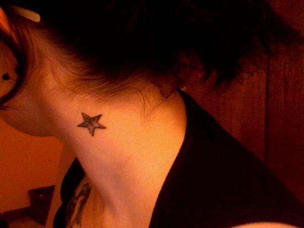Black star tattoo