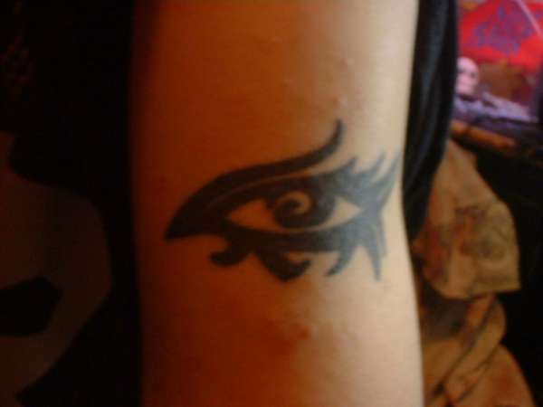 Tribal eye tattoo