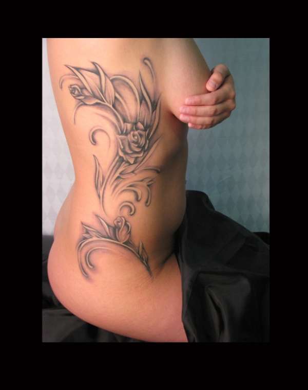 Rose Rib Tat tattoo