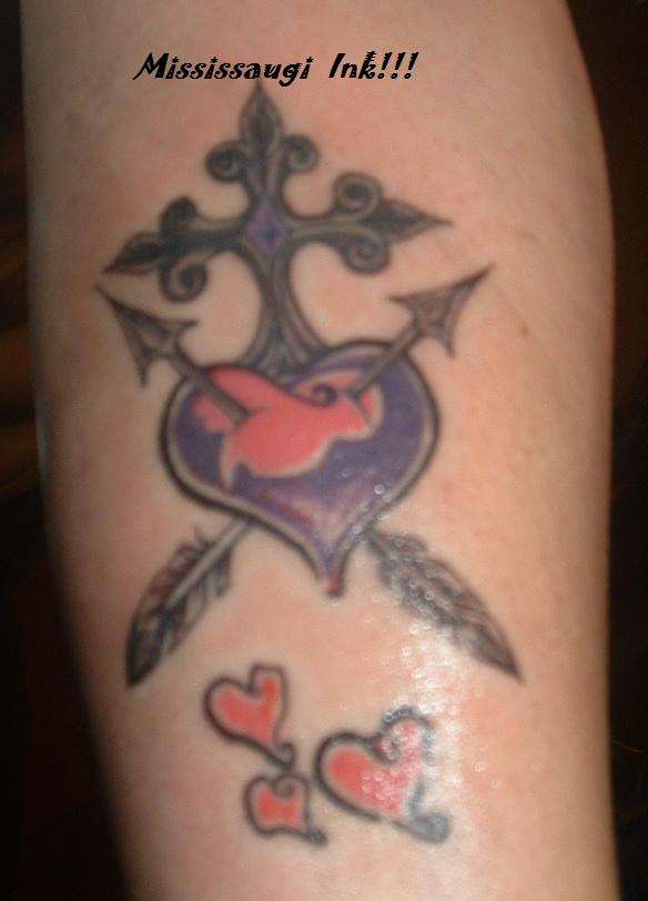 Heart and arrows tattoo