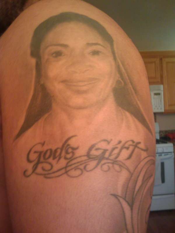 MOMS FACE tattoo