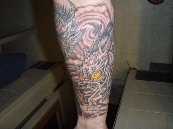 Ed Hardy Dragon right sleeve tattoo