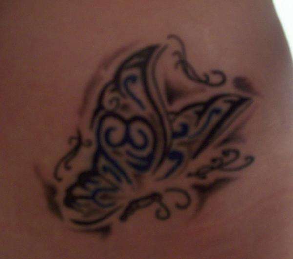 tribal butterfly tattoo hip