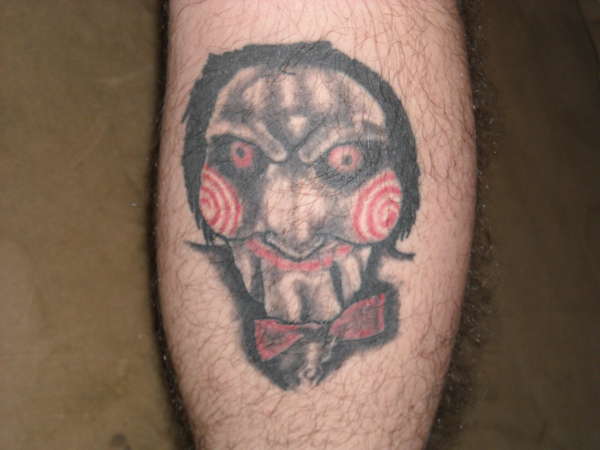 Billy doll from "Saw" tattoo