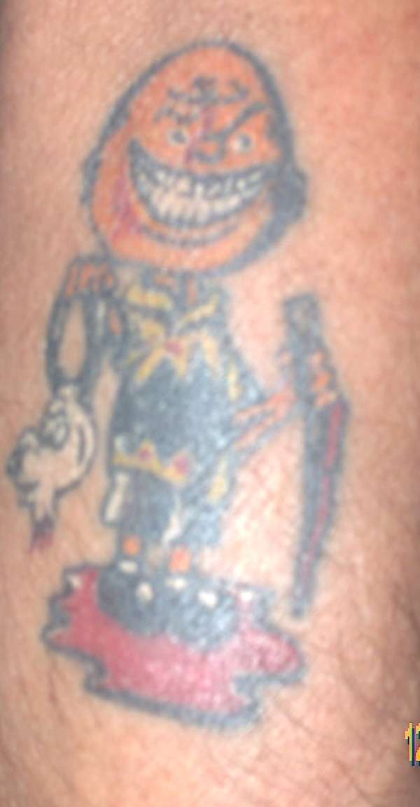 Evil Charlie tattoo
