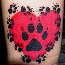 Paw Prints Over Heart tattoo