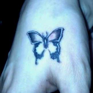 Tiny Butterfly tattoo