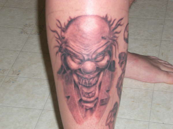 evil clown/congressman tattoo