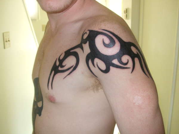 Tribal Peice tattoo