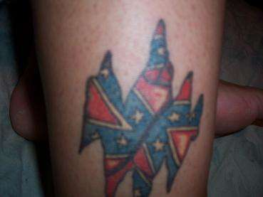 Rebel Tat tattoo