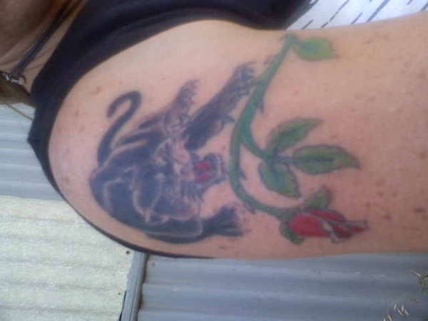 panther with rose tattoo