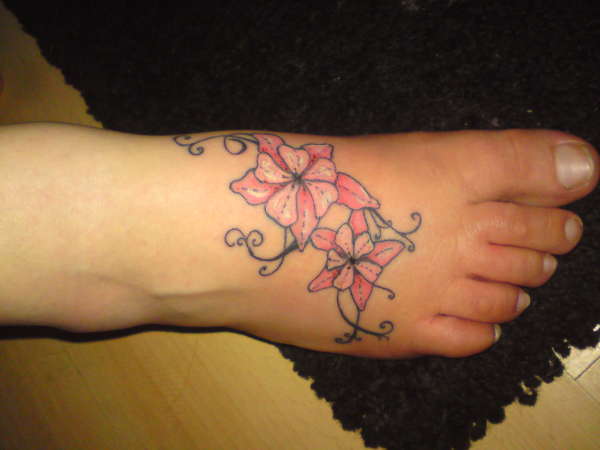 Flower tattoo on my foot tattoo