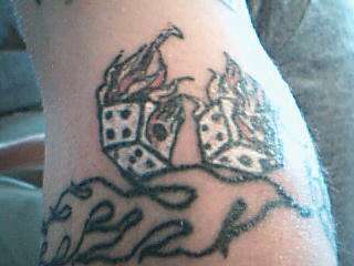 heres some dice tattoo