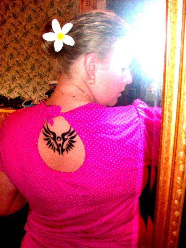 Tribal angel tattoo