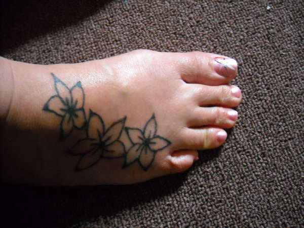 flower foot tattoo