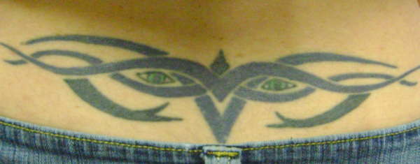 Tribal Eyes tattoo
