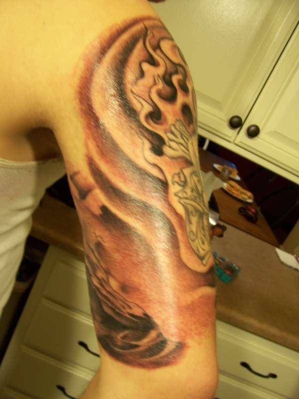 back of arm tattoo