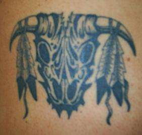 tribal cattle skull tattoo