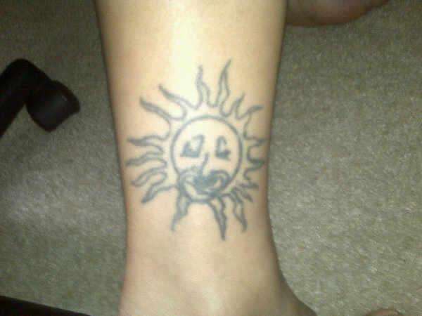 Ugly Sun tattoo
