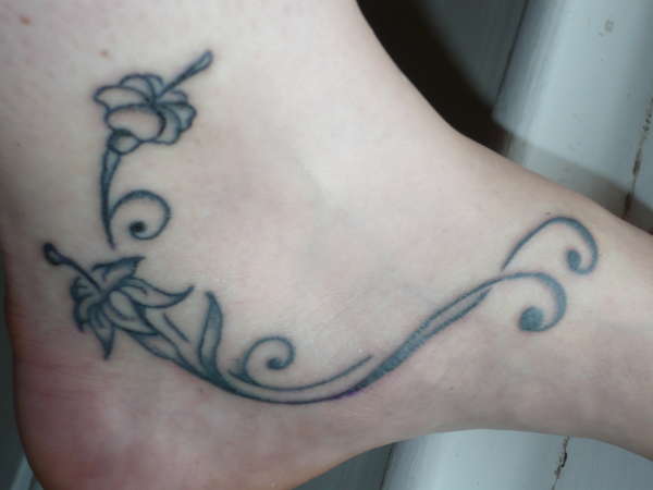 Lillies - inside foot tattoo
