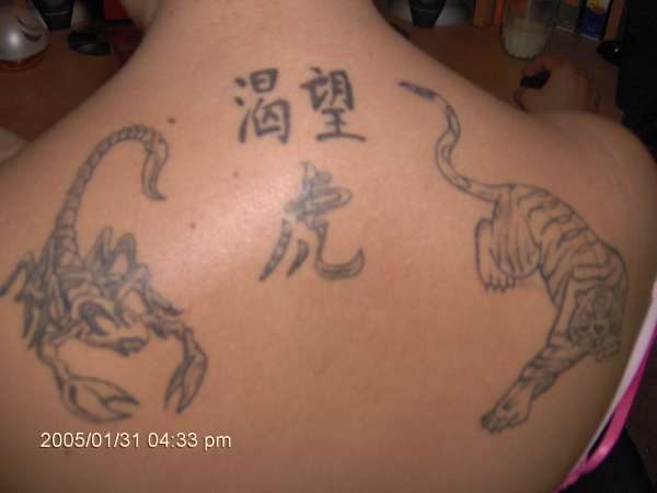 kanji...tiger....n scorpian tattoo