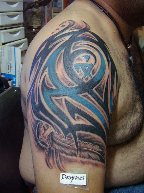 TRIBAL WITH COLOR ,BLACK AND FEATHER tattoo