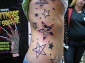 Stars on tha ribs tattoo