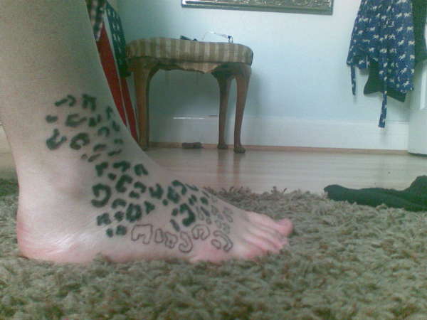 leopard print tattoos on foot