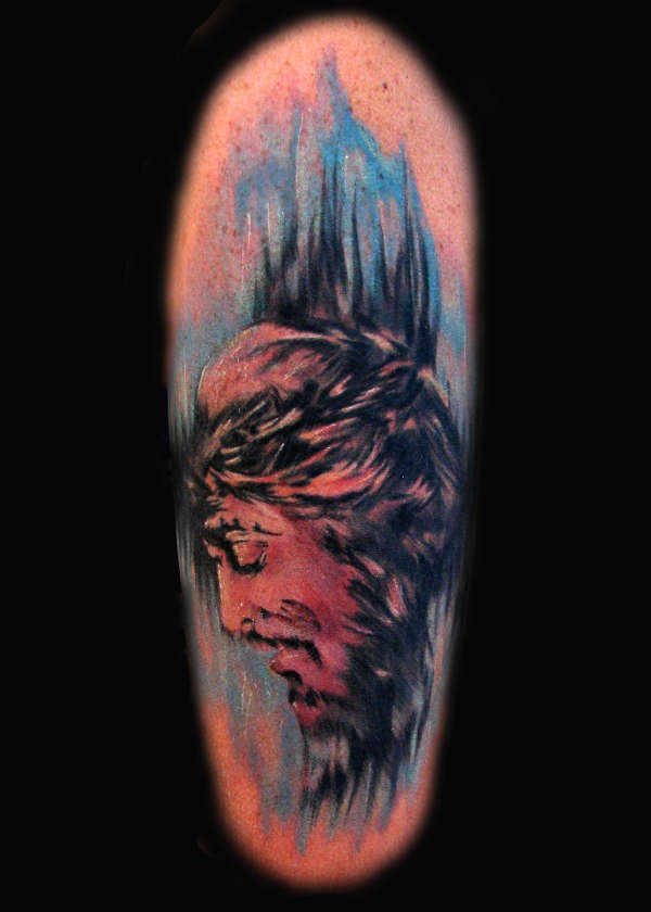Painting of Jesus tattoo