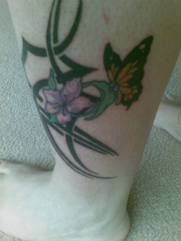 Tribal butterfly tattoo
