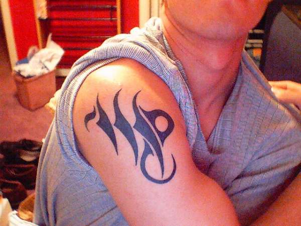 Tribal Virgo tattoo