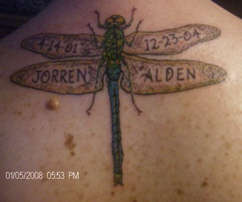 Dragonfly tribute to my kids tattoo