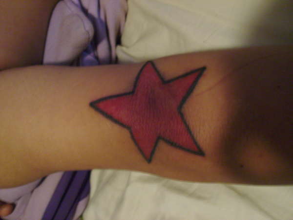 star on my elbow tattoo