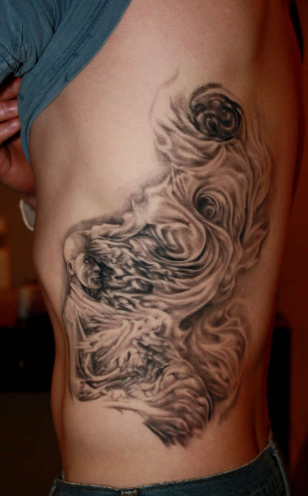 arron's ribs tattoo