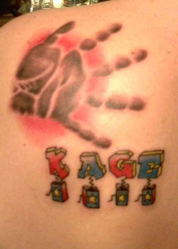 My son's handprint and name, tattoo