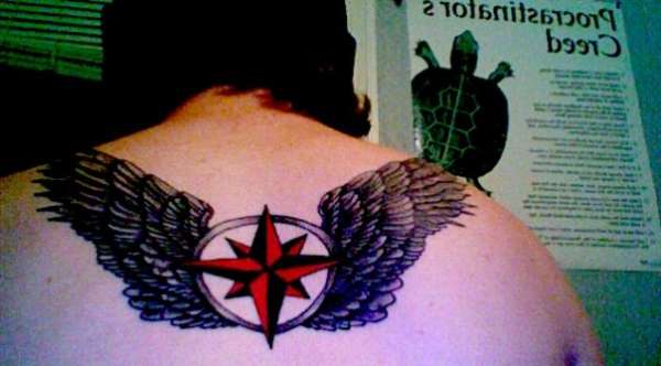 compass rose w/ wings tattoo