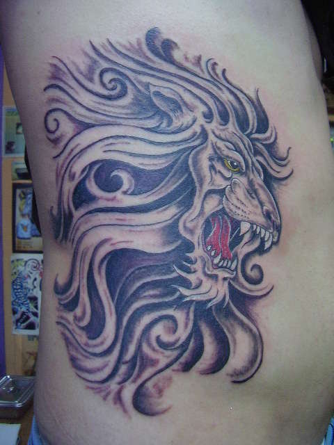 lion in black n gray tattoo