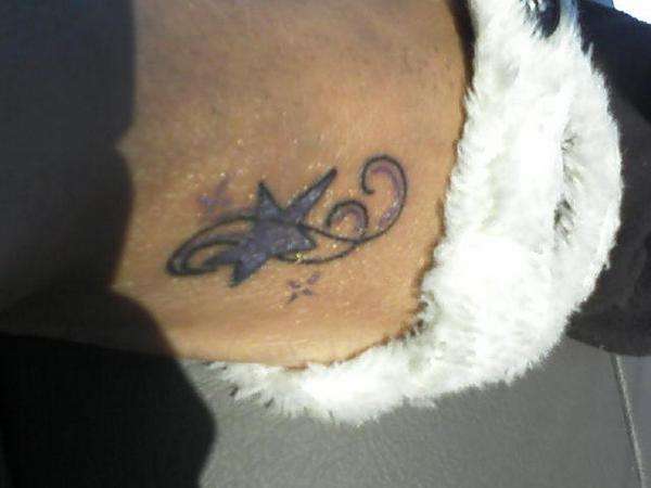 Star on my right foot tattoo
