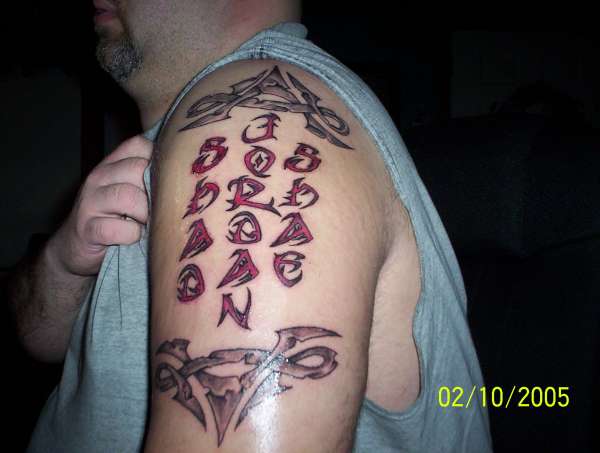 Tribal letters tattoo