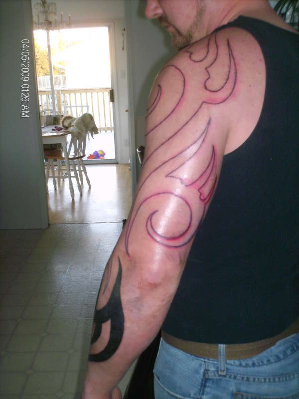 unfinised arm piece tattoo