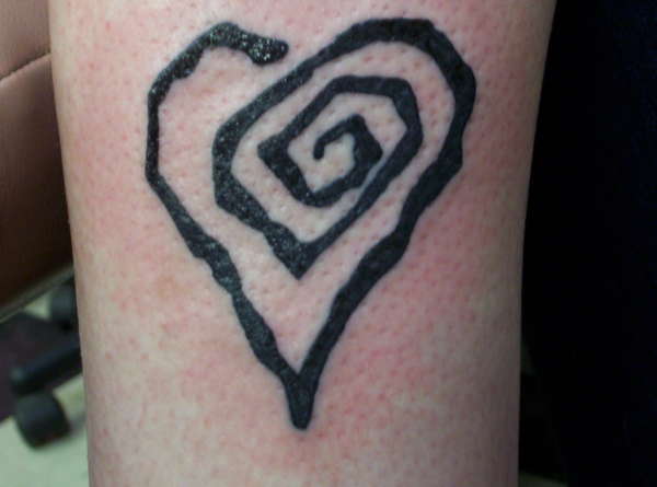 Manson heart tattoo