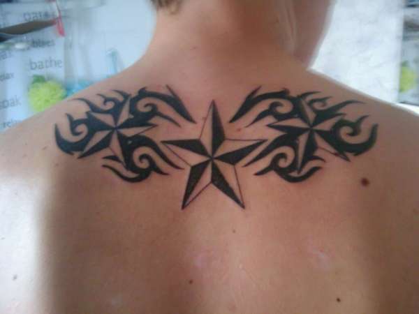 nautical stars and tribal tattoo